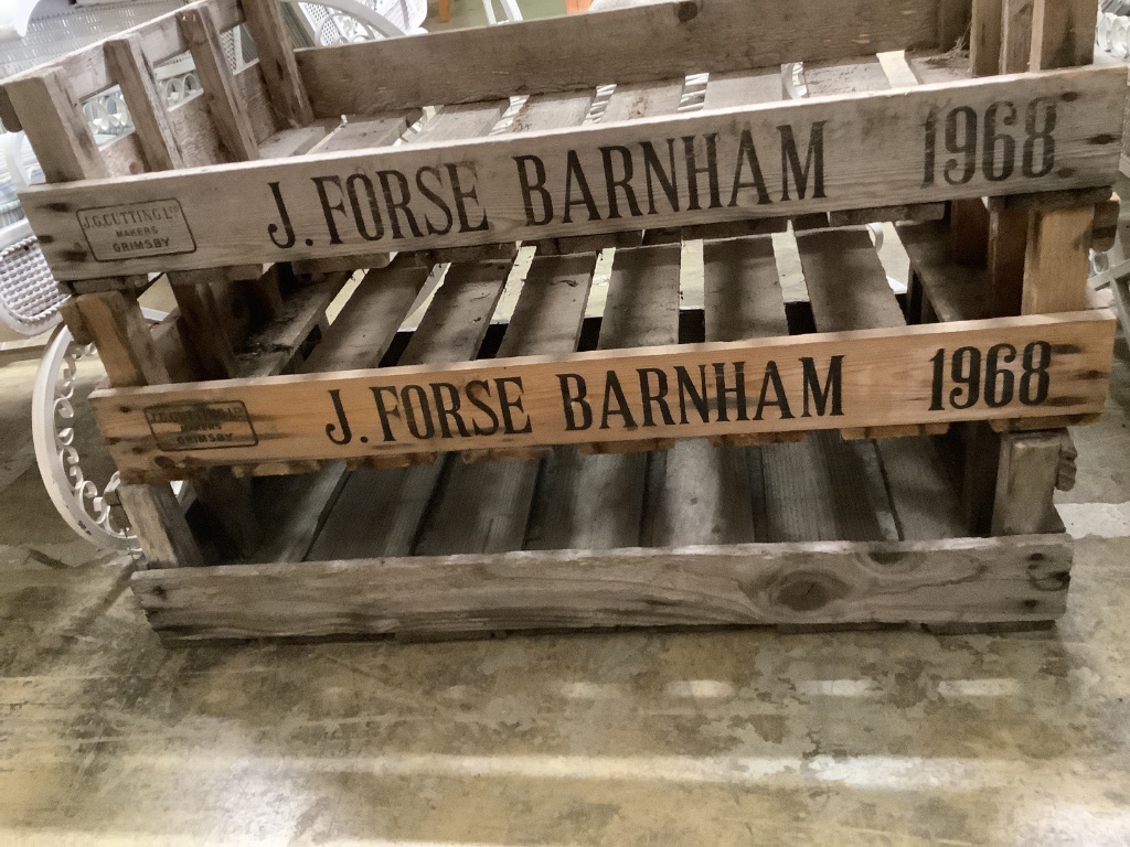 Three vintage apple boxes, width 76cm